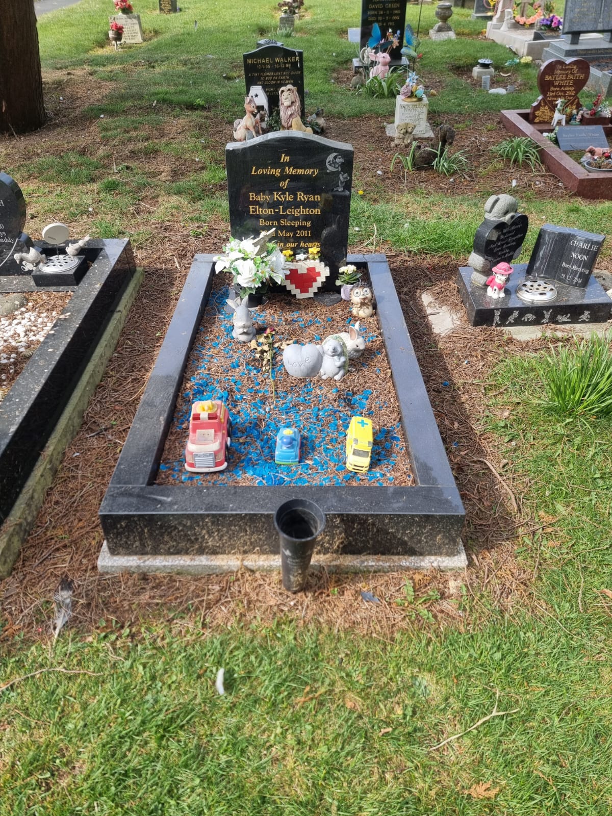 Before preservation - aged and discolored headstone